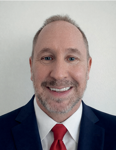 Greg M. Benson